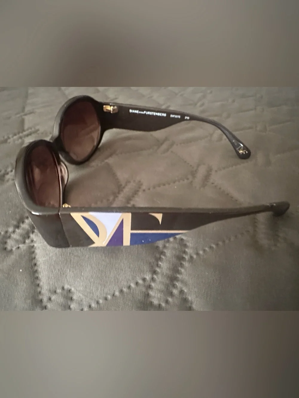 Diane Von Furstenberg (never worn) Brown Sunglasses with Gold and Blue Accent